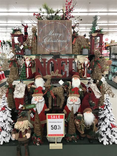 The star of Bethlehem sits between the "C" and "h" in Christmas, while a small nativity scene is set up within the curve of the "C. . Hobby lobby christmas decor